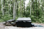 hot tub behind cabin